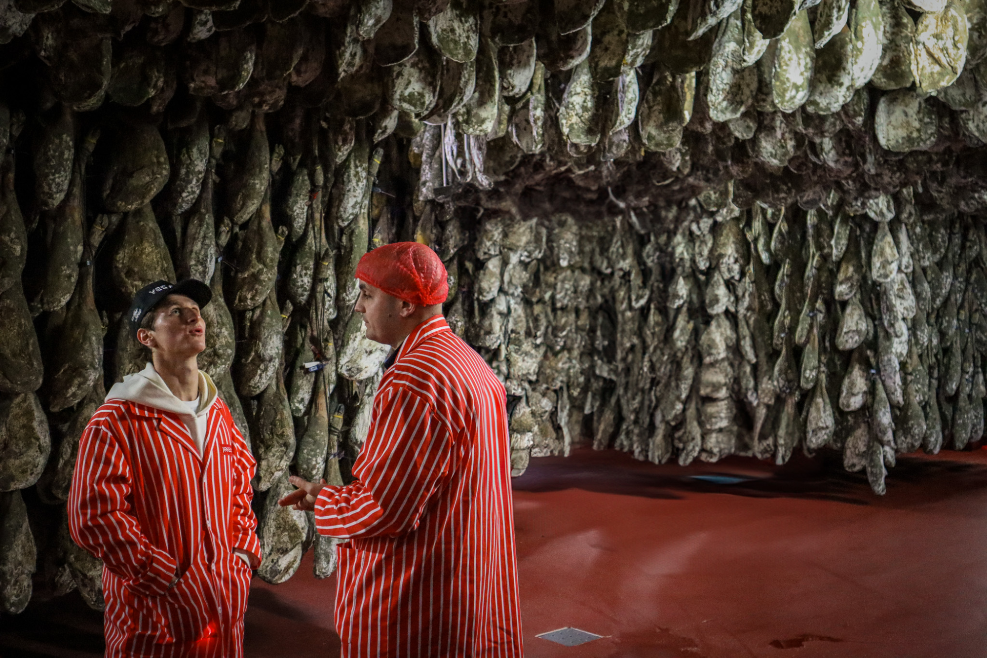 Workers in traditional striped uniforms