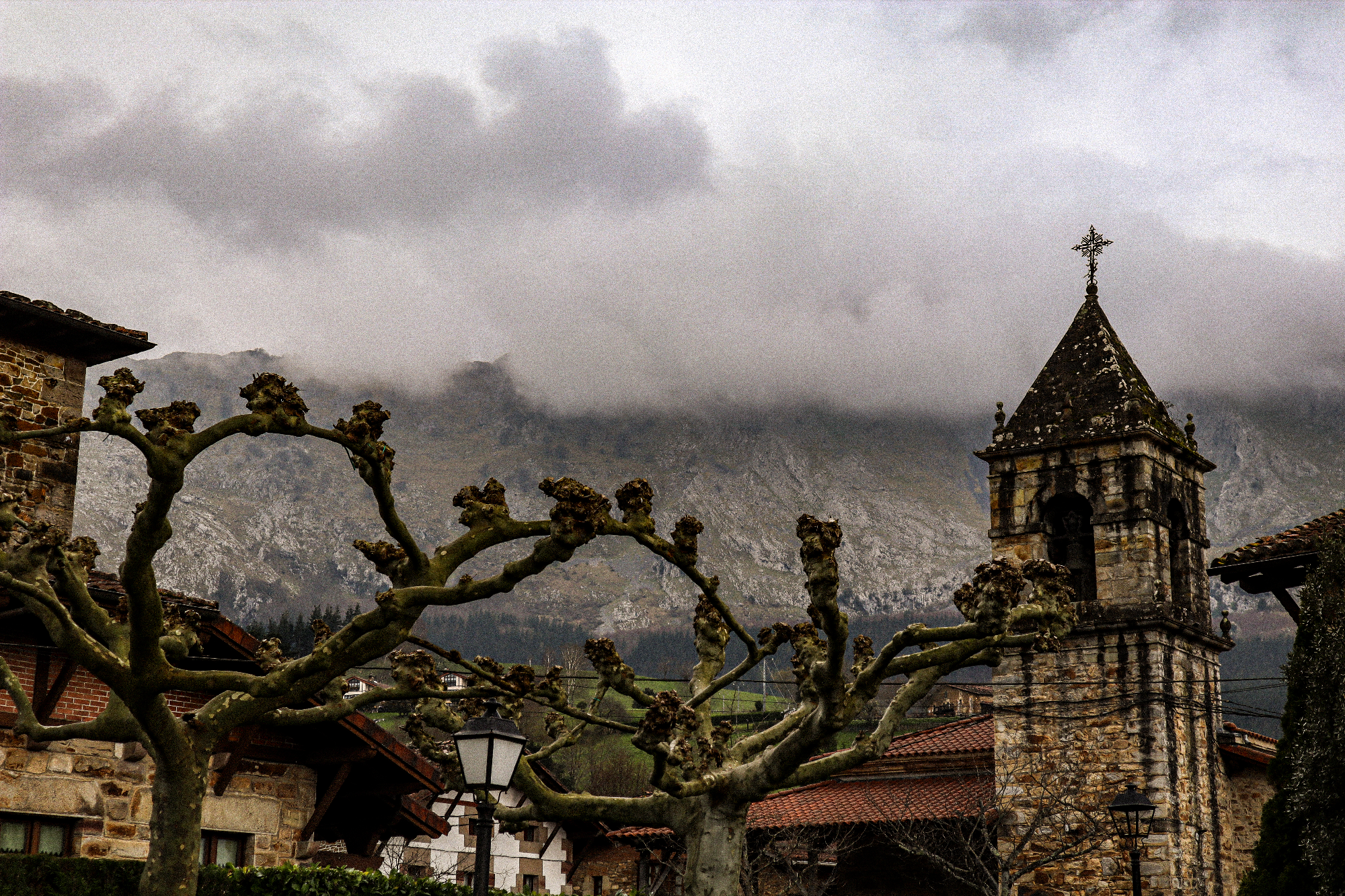 Church tower in mountains