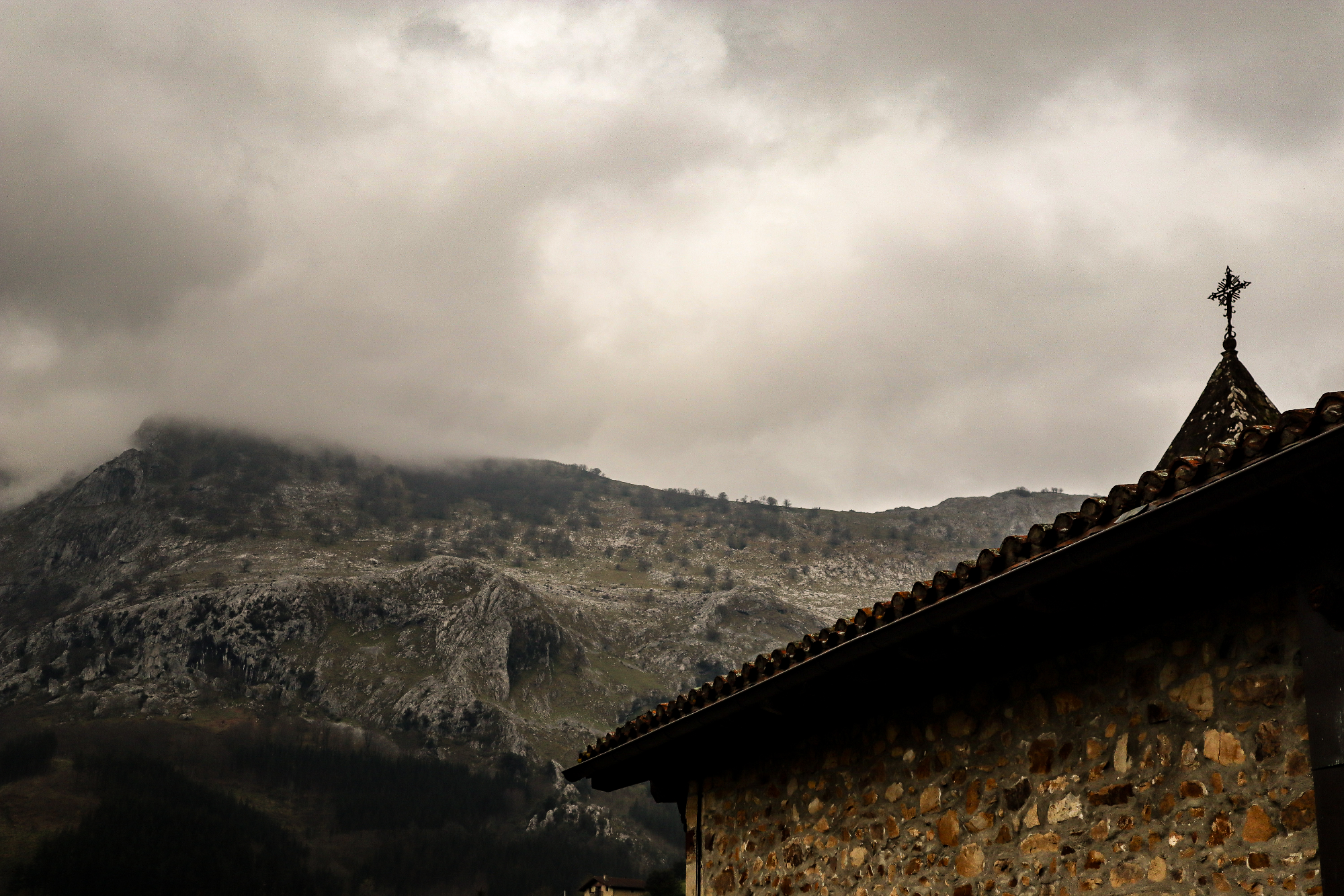 Mountain church with dramatic sky